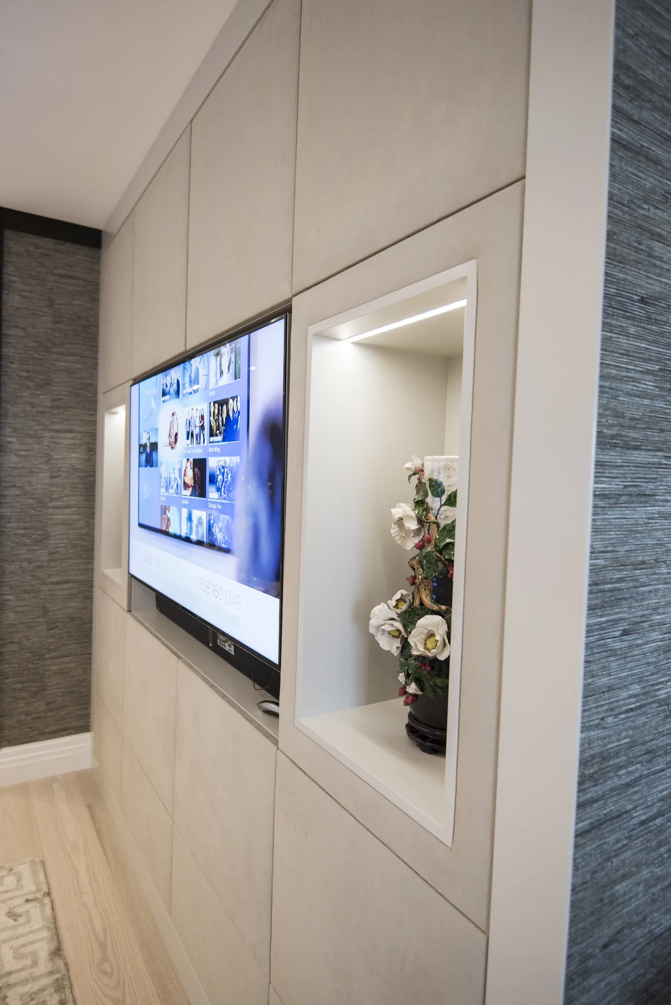 Angled view of cream TV unit and shelving