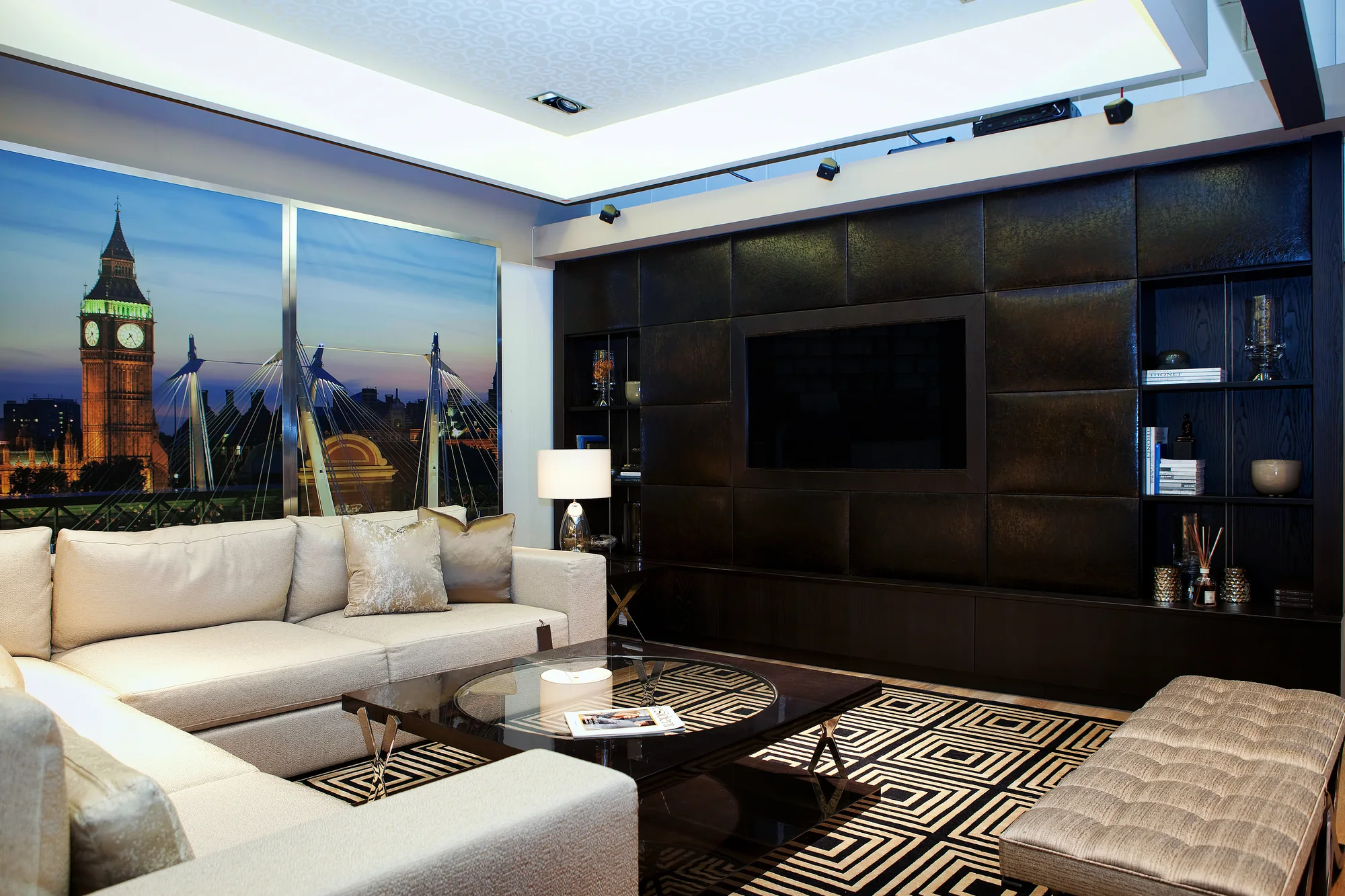 Wide living-room view of full-wall media furniture