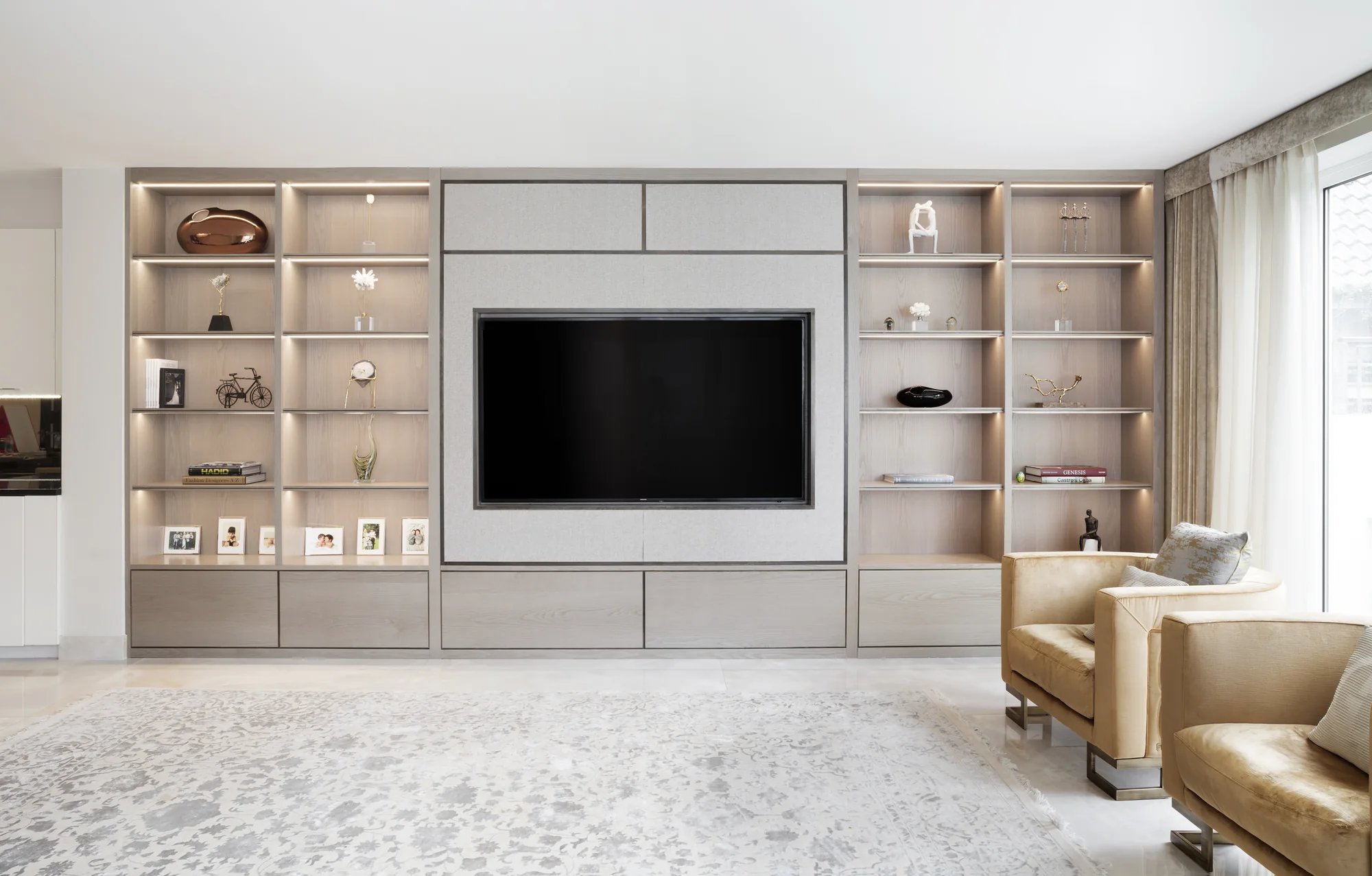 Front view of media wall with display shelving