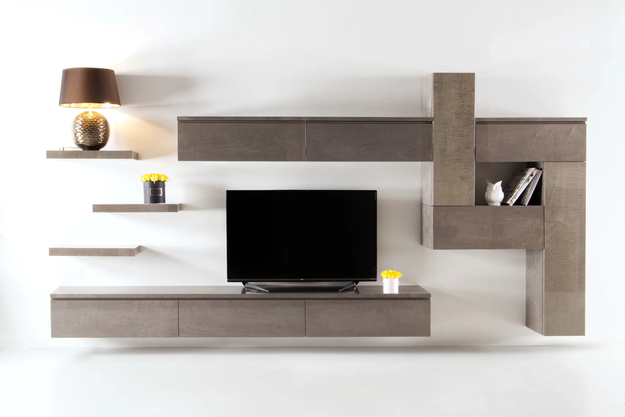 Light grey wall-mounted media unit front view