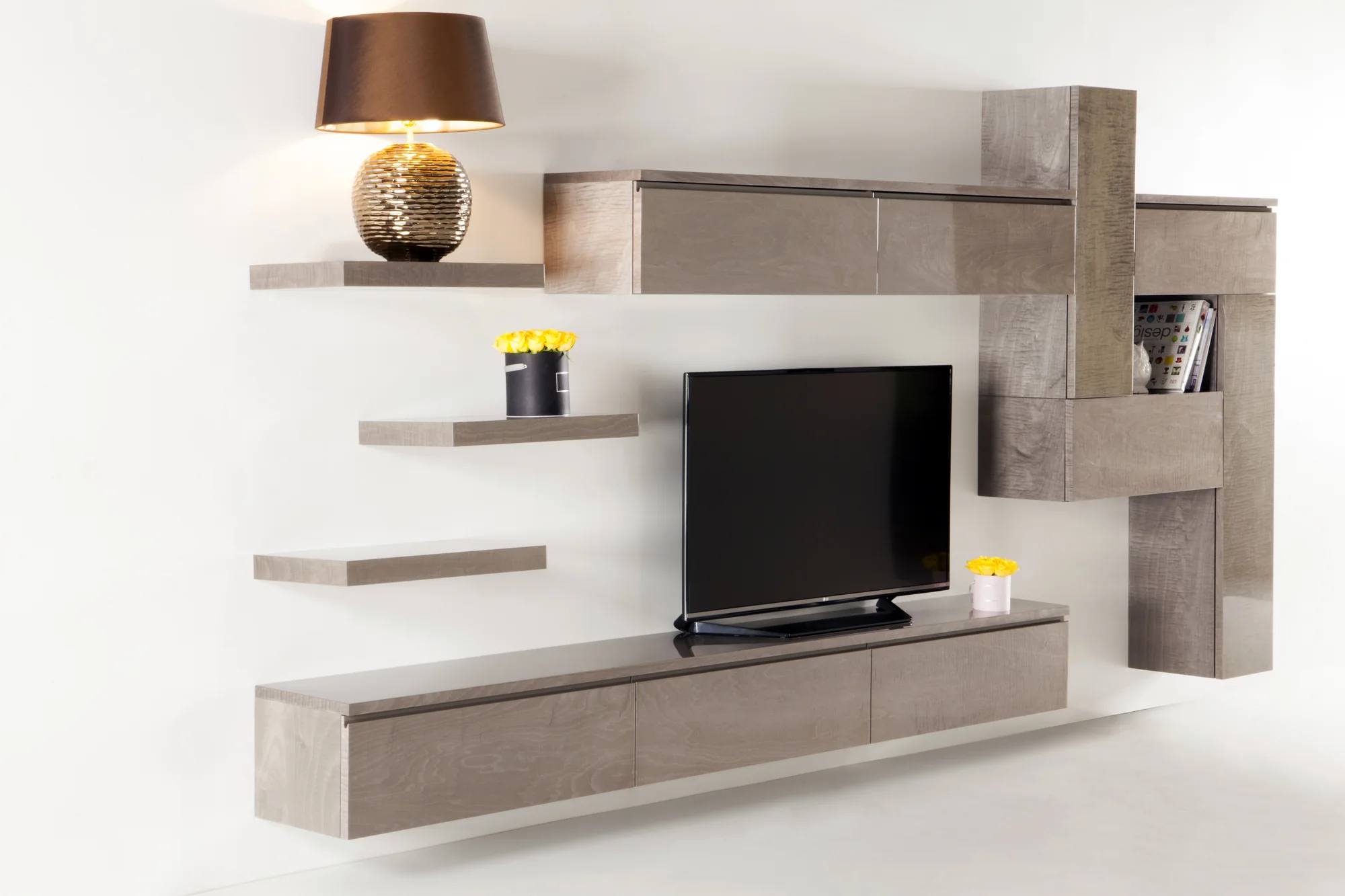 Angled view of light grey wall-mounted media furniture