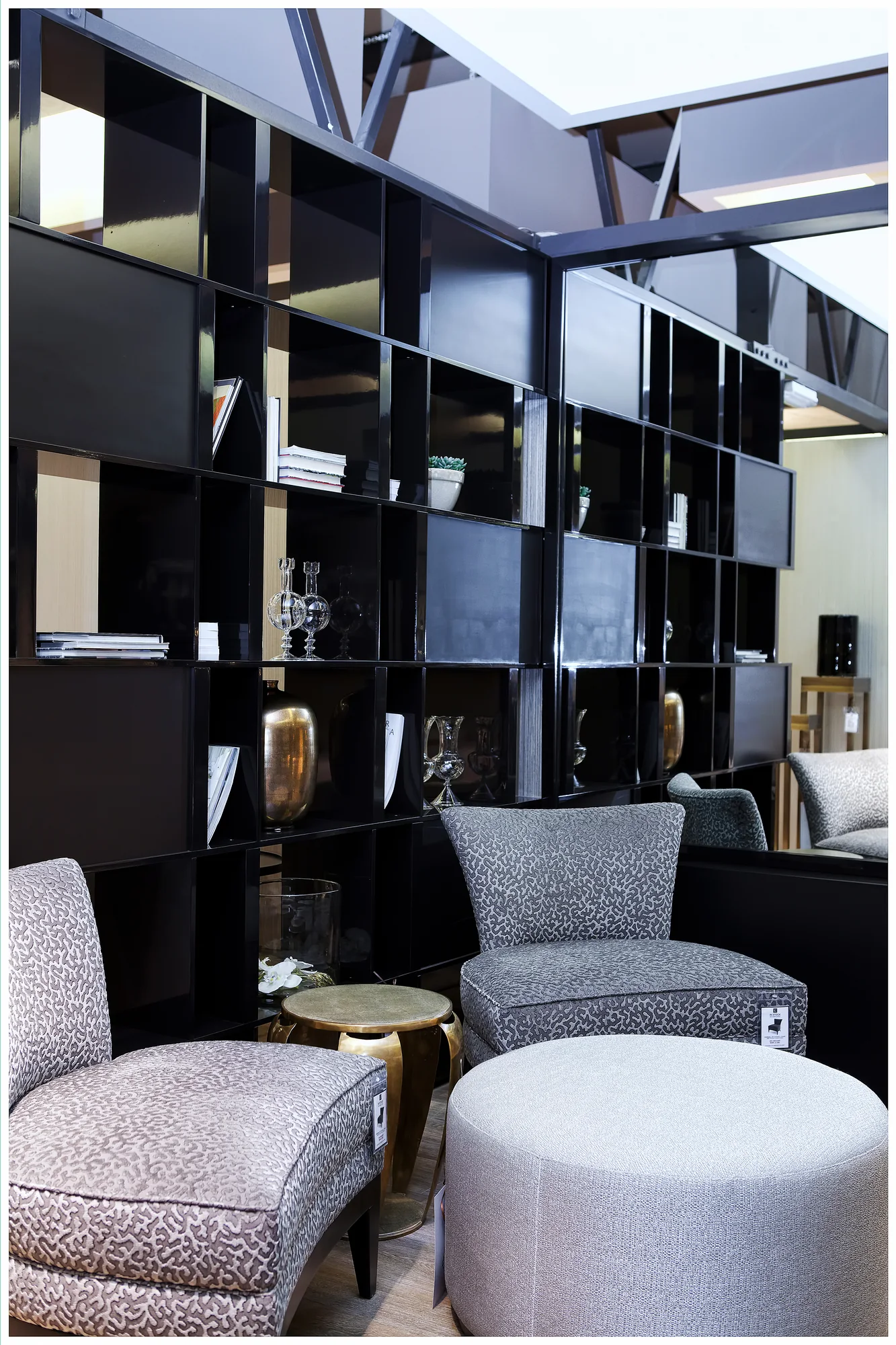 Angled view of the dark open shelving structure