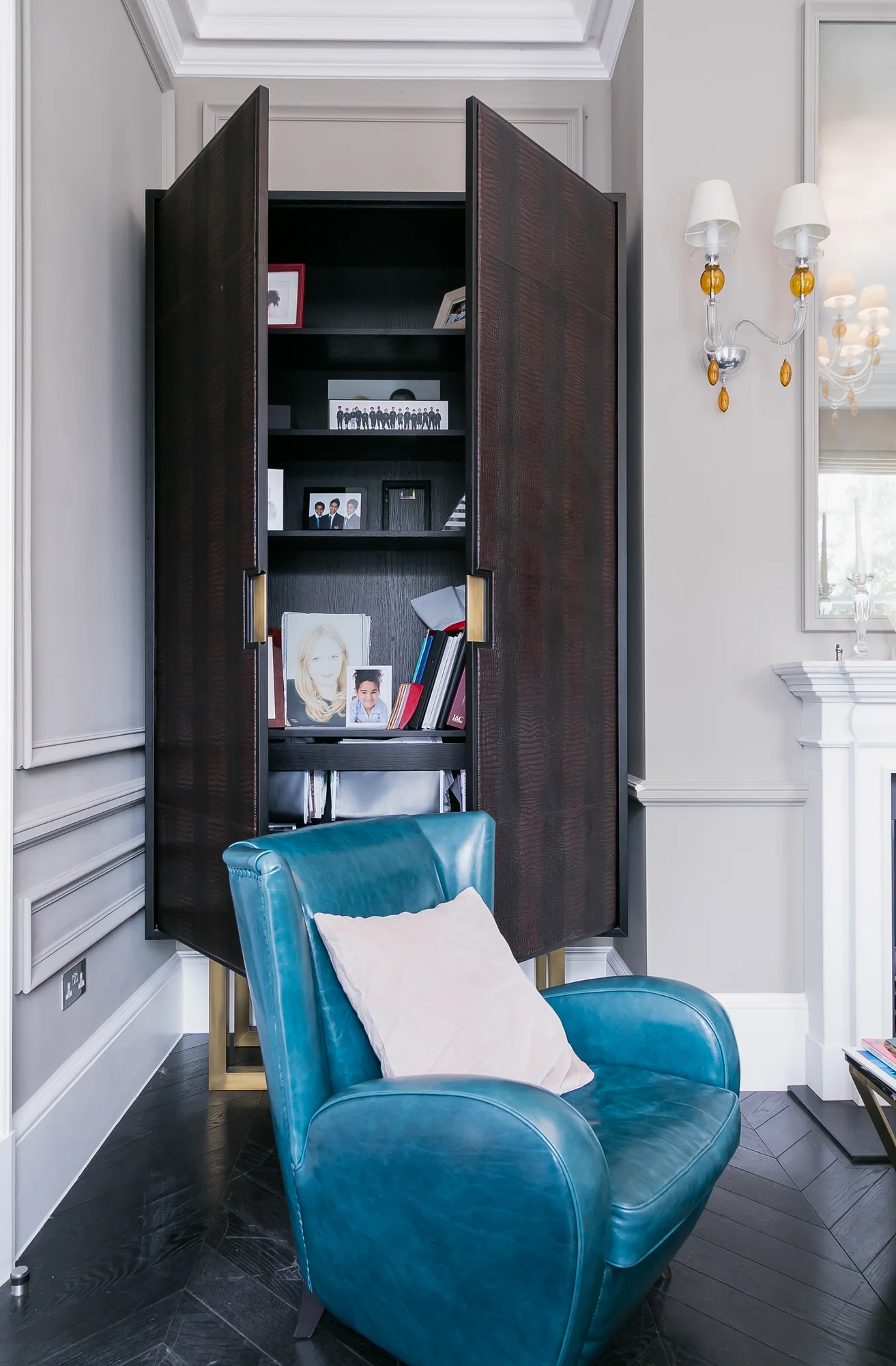 Open cabinet showing concealed internal shelving